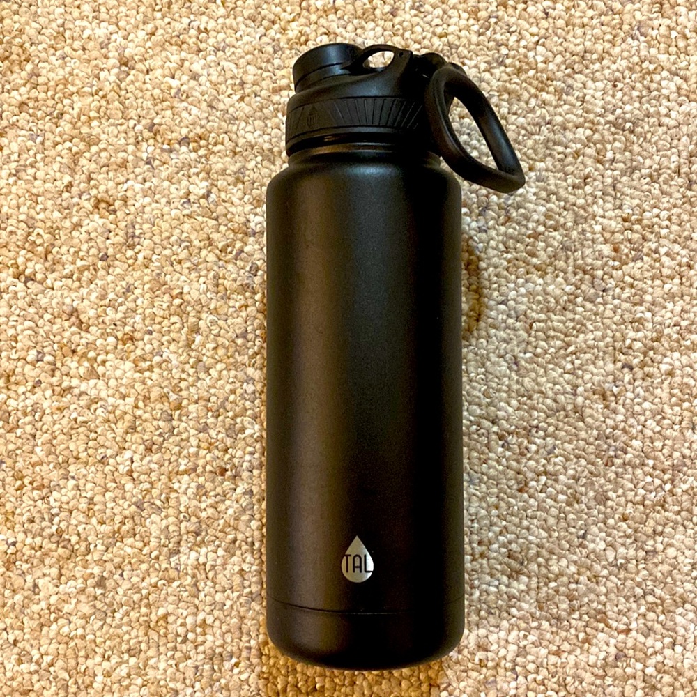 TAL 40 oz black insulated water bottle new never used
